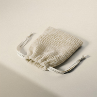 Bolsita de algodón para el ritual de ducha